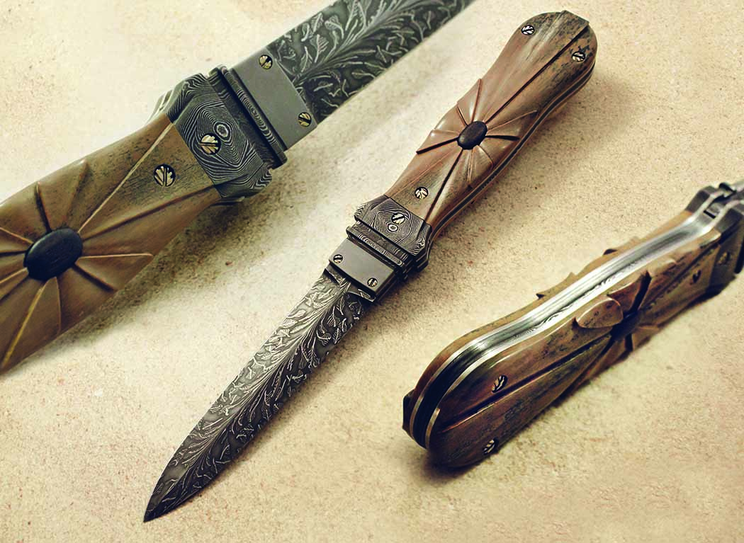 Jon Christensen’s San Francisco-style folder includes a blade of feathered leaf damascus steel and a handle of carved mammoth ivory with inlay of 4,500-year-old bog oak. Quite a period knife. (ChantryLeePhotography.com image)