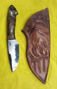 Craig Myles craftsmanship on the leather sheath makes this Barefoot WTC custom knife truly one of a kind.