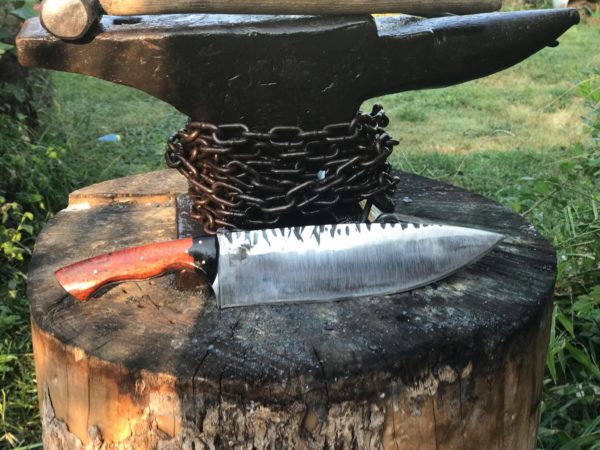 This large chopper was forged by deaf bladesmith Buddy Thomas of Tree of Liberty Bladecraft and Forge.