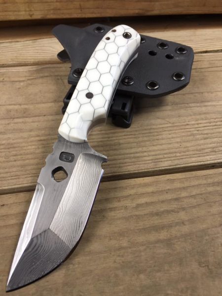 Chris Rowley opted for Voodoo Resins for this duplex-ground drop-point skinning knife.