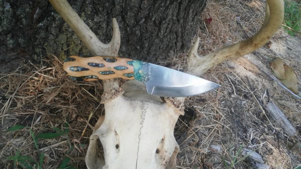 Will Thompson added a Plantstone handle to his traditionally patterned drop-point skinner.
