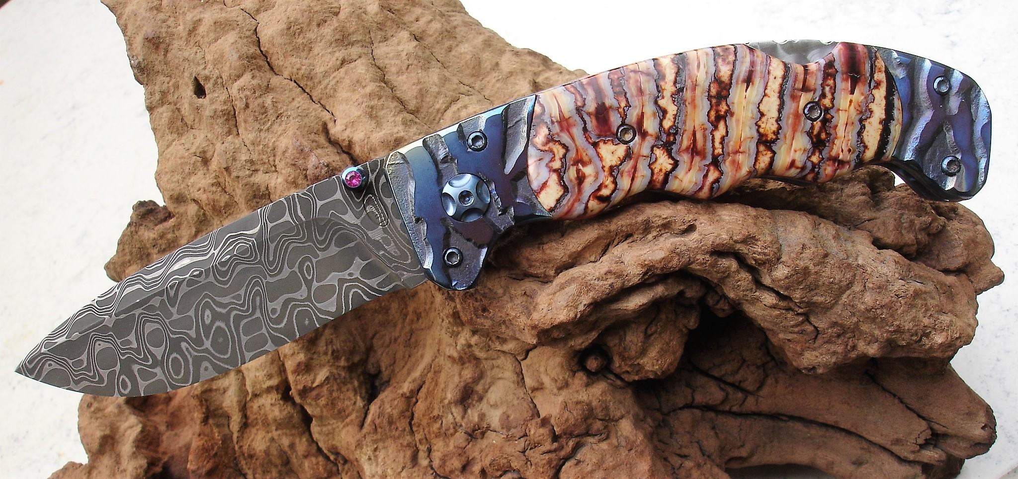 Tim Lambkin does meticulous filework inside and out on his folding knives.