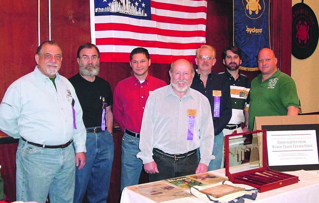  Keith Kaiser (right) was in Ladder Company 131 of the New York City Fire Department that reported to the World Trade Center on 9/11. In 2003 he enlisted several leading makers to produce knives with blades made from WTC steel. Those makers, with the exception of Mel Pardue, from left are: Bob Terzuola, Bob Dozier, Allen Elishewitz, Gil Hibben, and Pat and Wes Crawford.