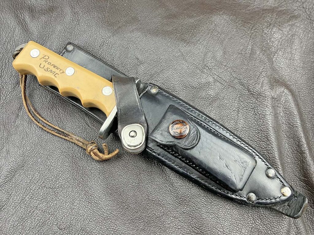 Leatherworker Clarence Moore made the sheath for the prototype Airman according to Bo Randall’s design. Moore made the sheaths for the earliest full-tang knives until Heiser took over production in 1955.