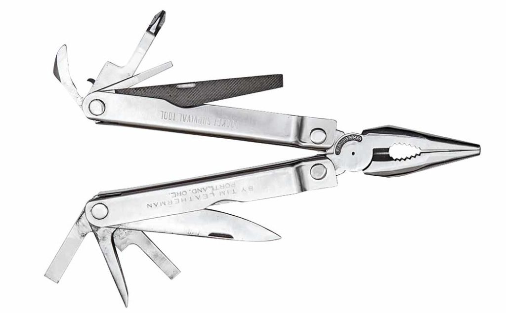 Tim Leatherman holds the multi-tool (also inset) that started it all: the original Leatherman tool, the PST (Pocket Survival Tool).