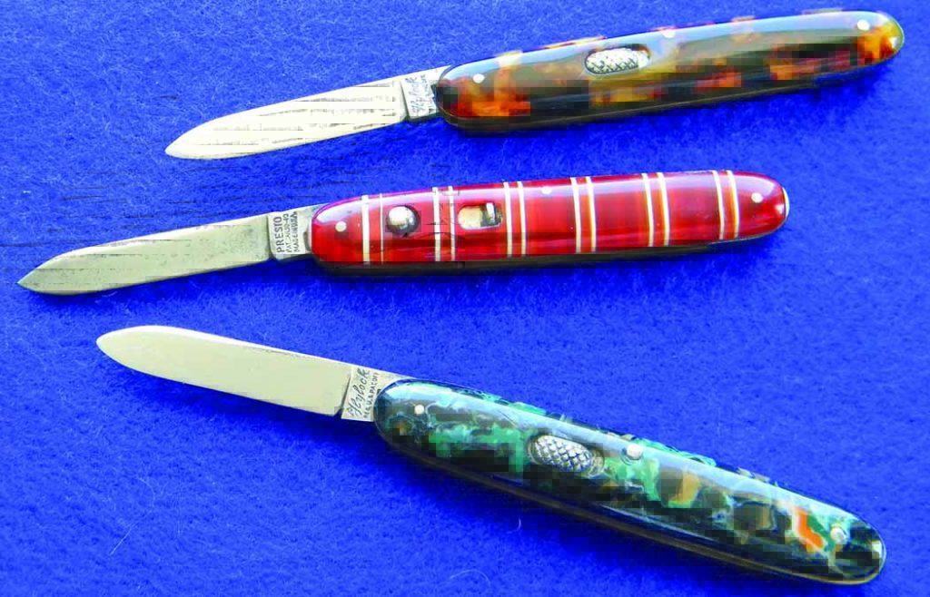 Celluloid was a very popular handle material on antique switchblades. Celluloid types, from top: a George Schrade in imitation tortoise, another George Schrade model in candy stripe, and one from Flylock Knife Co., in blue, pink and black swirl.
