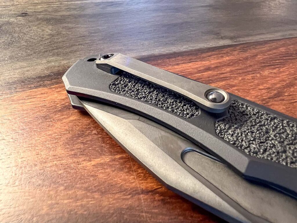 The Heretic Wraith V.4 comes standard with a steel pocket clip that works very well. For $49 extra, you can upgrade to a milled titanium clip with a carbide ball.