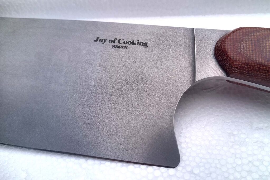 Joy of cooking logo on blade