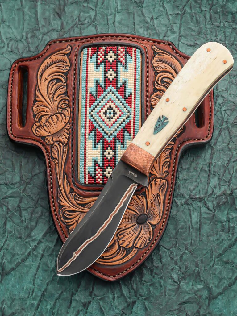 When it comes to slip joints, Bubba Crouch is a must-stop at BLADE Show. His skinner, with a 3 1/2-inch copper san mai blade, came complete with a sheath by Will Anderson, with beadwork done by Kelly Faulcorer. (SharpByCoop image)