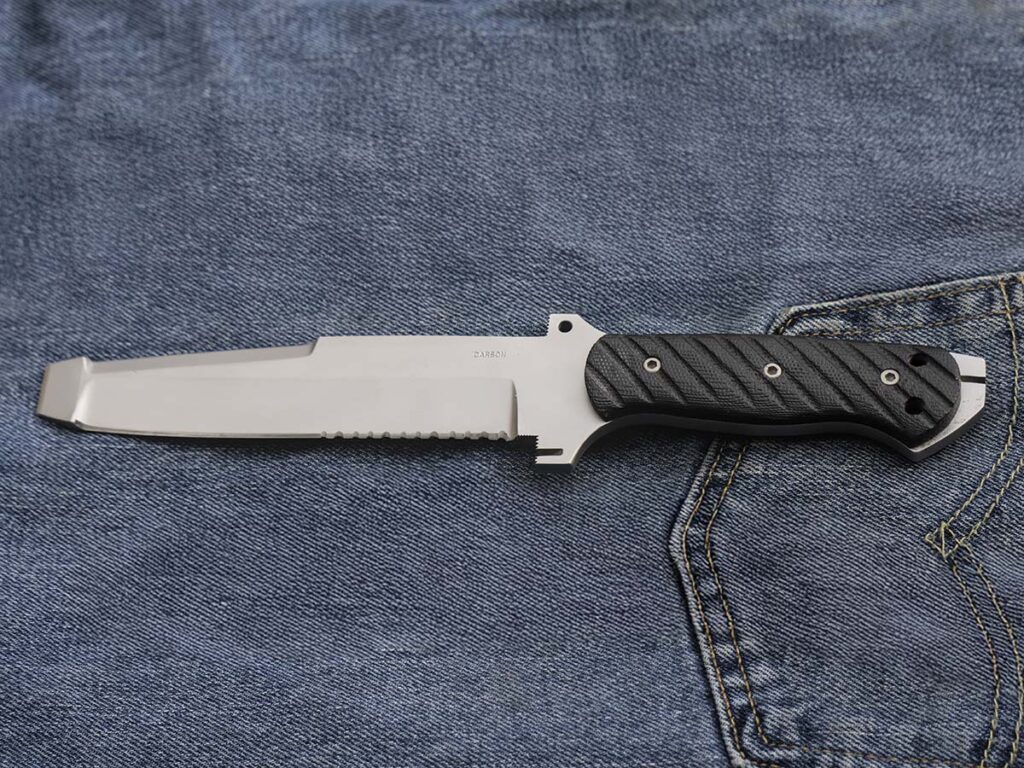 Veteran EOD tech Rob Cude said Bowie would carry at least two knives. One might be like the knife Cude and Kit Carson designed that eventually became the Buck Knives Intrepid. The original design featured a special wedge-shaped tip, a sharpened spine area for cutting metal straps and an exposed tang for durability during hammering.