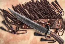 Raymond Richard’s bowie took Best Fighter at the 2018 Oregon Knife Collectors Association Show. Fifteen inches overall, it’s big and enhanced with a frontier-style sheath—with genuine badger claw, buffalo tooth and rattlesnake skin inlay—crafted by Grey Leather Co. (SharpByCoop image)