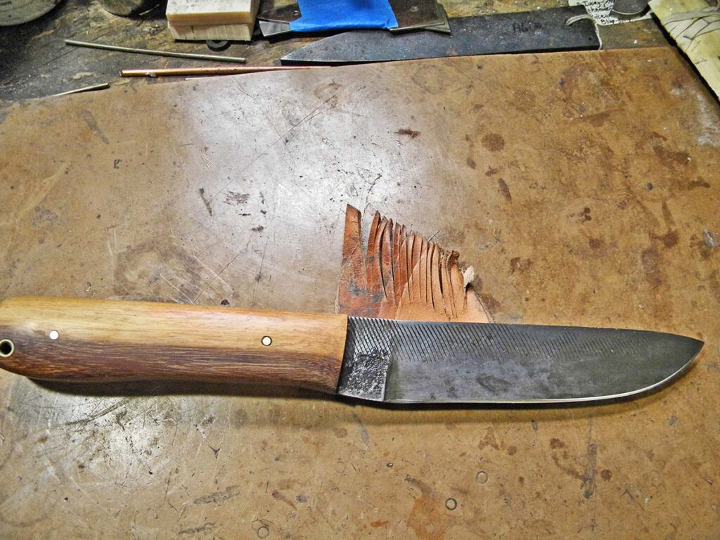 The Bushcrafter cruised through the 8-ounce leather very quickly with straight cuts.