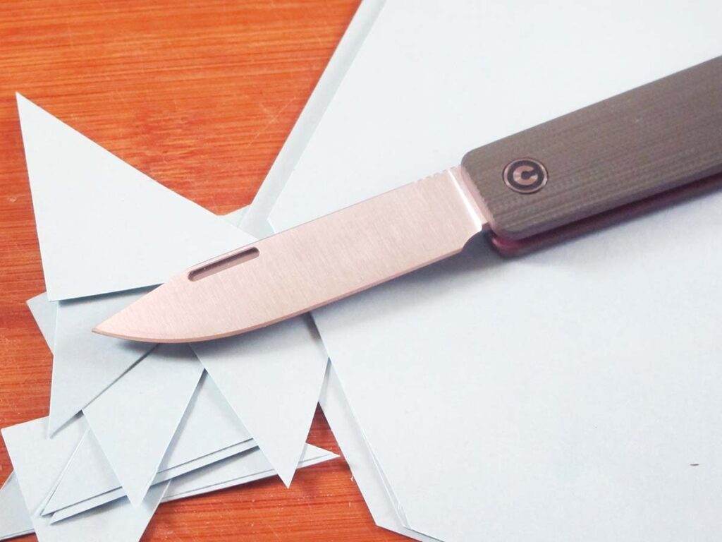 The author kept the Civivi Slippy Sendy on his office desk for a few days and tested it cutting various and sundry “desk stuff.” The 2.8-inch Nitro V stainless blade was plenty sharp and did a good job of cutting crisp, sharp lines on this card stock.