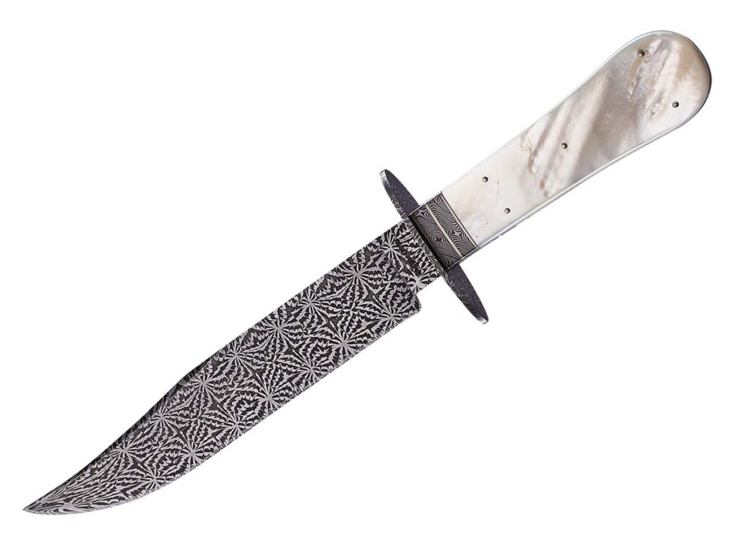 Shayne Carter took home Best Damascus at BLADE Show 2021 for his gent’s bowie in a Fourth of July pattern. Noted Shayne, “In many ways, damascus has become a worldwide language. Techniques and influences now cross borders freely, creating a global community of makers.” (Whetstone Studio knife image)