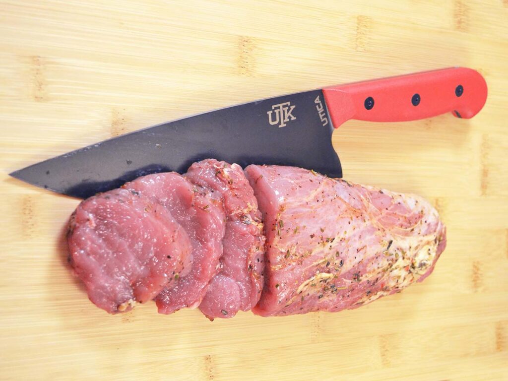 The Utica Meat Dad Chef’s Knife is for large cuts of meat, fruits and vegetables. It took half-inch medallions off a plump pork tenderloin for the sauté pan.