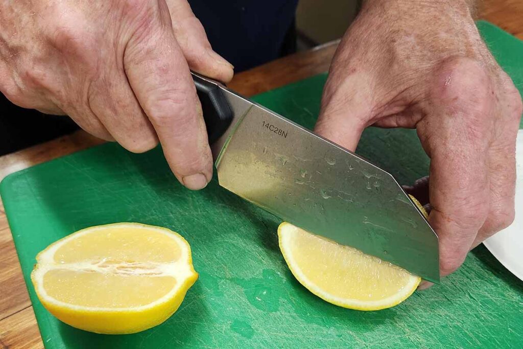 The Bear Professional Chopping Knife has a full handle and the 5-inch blade