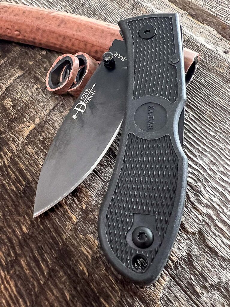  Even though S35VN is stainless, the Dozier comes with a DLC-coated blade for low glare as well as added corrosion resistance. Raised diamond texturing molded into the handle does a great job at keeping your hand in place even when wet. Country of origin: Taiwan. Closed length: 4.25 inches.
