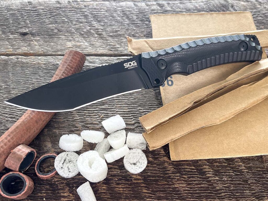 Thicker materials like cardboard and hose are no match for the blade of the SOG Hidaka FX 3V, a Kiku Matsuda design. A slight hint of a recurve to the main cutting edge no doubt helps cutting power. Overall length: 10 inches.