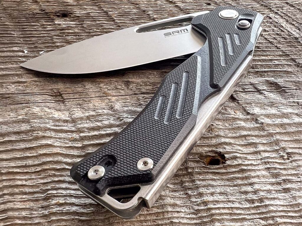 The SRM Mirage folder’s integral liners comprise what the company calls the Mono Chassis. Instead of using two separate plates, the Mono Chassis is bent from one piece of steel, as evidenced by the integral backspacer. This results in a stronger handle design that also supports the knife’s Ambi Lock.