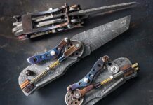 The 4.25-inch blade and frame of Lonnie’s Steam Hunk are feather damascus. Scales: brass, steel and wrought iron. Spacer: wrought iron. Various steel parts are heat blued. The knife carries the Serial Number 8 and comes with a letter of authenticity. (SharpByCoop image)