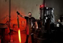Jesse Harber holds a huge billet of Vegas Forge Damtanium—titanium damascus made with Grade 2 and Grade 5 titanium—after forging it. It was for a customer who wanted a Damtanium sword. “We forged the material to spec,” Jesse wrote, “and then coordinated with Blake Griffith at Griffworx to machine the sword.”
