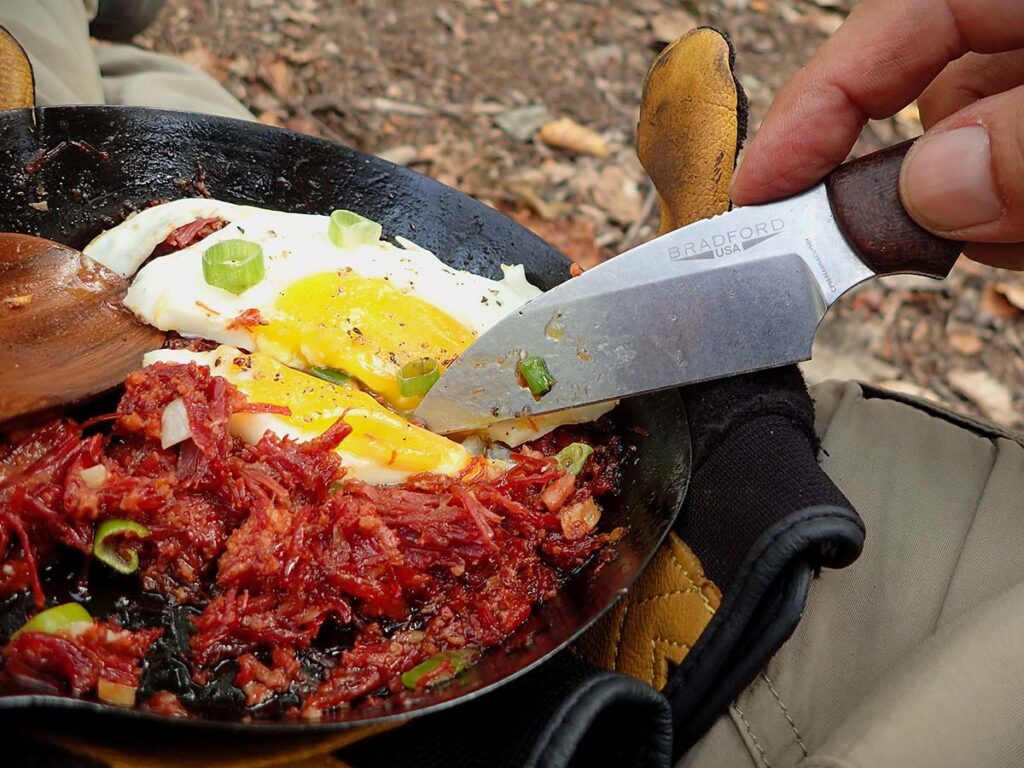 Wharncliffe and sheepsfoot blades allow you to choke up toward the tip and use a forefinger for fine control work. The author used the technique with the Bradford USA G3 Wharnie on a fried egg eaten right out of his carbon-steel skillet.