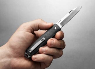 James Brand Ellis open and held in hand