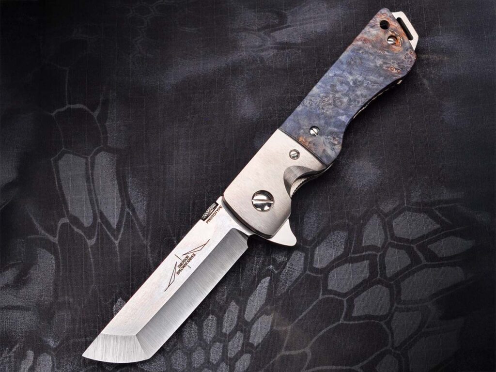 Megan parlayed her long-time admiration for tantos into the Shinobi/M-Shinobi. Though she has been involved in making design suggestions for many years, it is the first knife she designed entirely by herself. As she noted, “The CQC-17 model blade design was my idea, and I am sure you can see the similarities in [the Shinobi].”