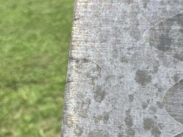 A light etching in ferric chloride verified the presence of welding flaws in this damascus blade.