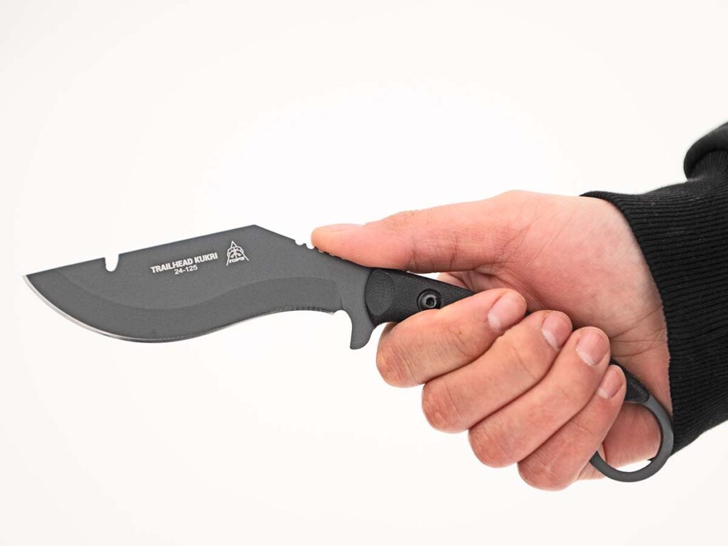 Craig Powell said one of the specific reasons for Micarta® or G-10 handles on TOPS knives is to provide a good grip when you need it. “Micarta is one of the best for grip even when wet and whether you have gloves or not,” he observed. The TOPS Trailhead Kukri has black canvas Micarta scales. (TOPS image)