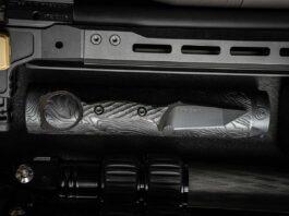 Toor/Silencer Shop Hendrix knife on a flashlight.