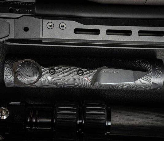 Toor/Silencer Shop Hendrix knife on a flashlight.