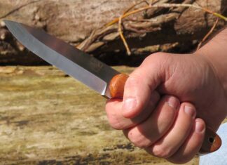 The Saker bushcraft knife by the author’s Diving Sparrow Knife Works in hand. As he writes, “Man is a tool-using animal. Without tools, he is nothing—with tools he is all.” (Thomas Carlyle image)