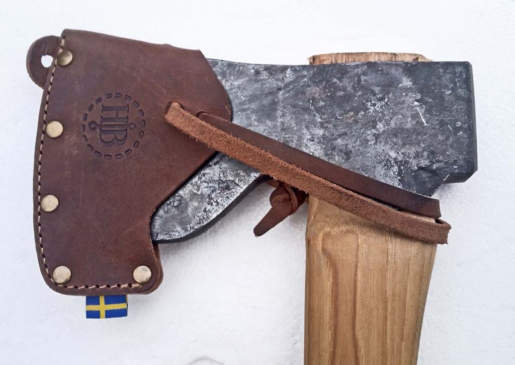 The leather edge cover is a strap-on model.