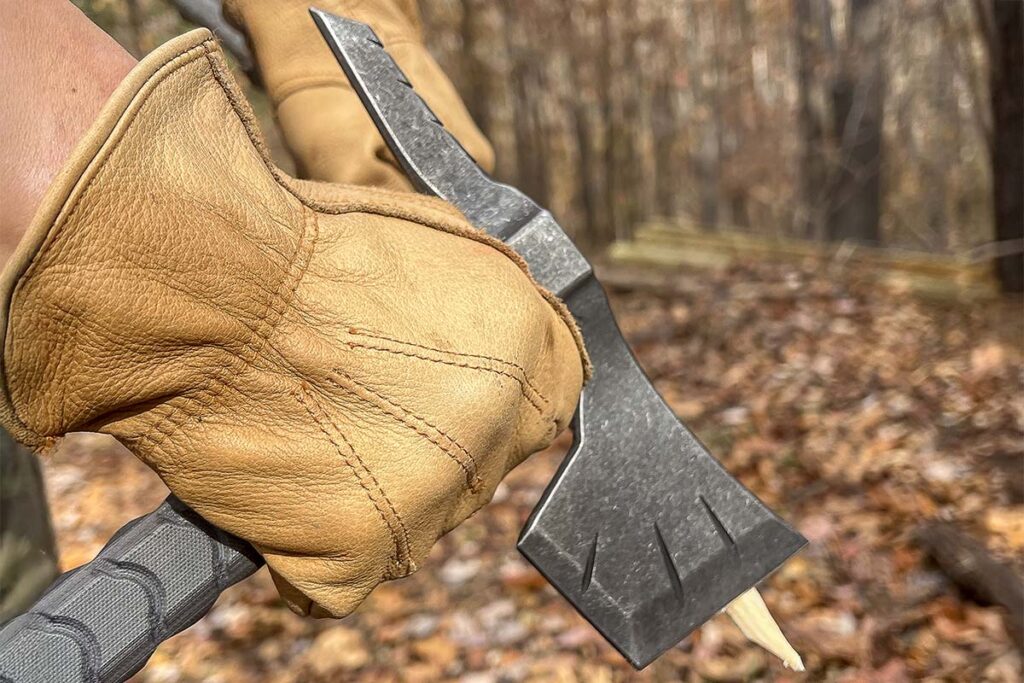 The War Fighter’s 4-inch head and spike are 3Cr13MoV stainless steel in a black stonewash finish. The head’s underside is sharpened for more cutting versatility. The spike is beveled.