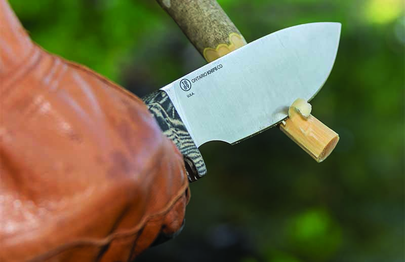  The deep-bellied blade of the Ontario ADK Keene Valley Hunter slices large cutting jobs down to size. ADK is short for the Adirondack Mountains, a range in Ontario’s home state of New York.