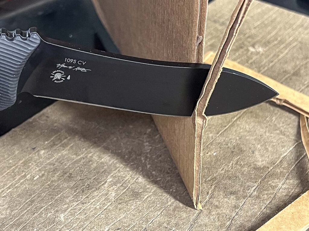 The skinner-like blade of the Spartan Harsey Nessmuk excels at slicing tasks.
