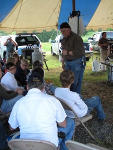 ABS journeyman smith Wes Byrd instructs young students on the art of the forged blade at a past ABS youth hammer-in.