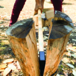 Cold Steel Trail Boss splitting an Oak log