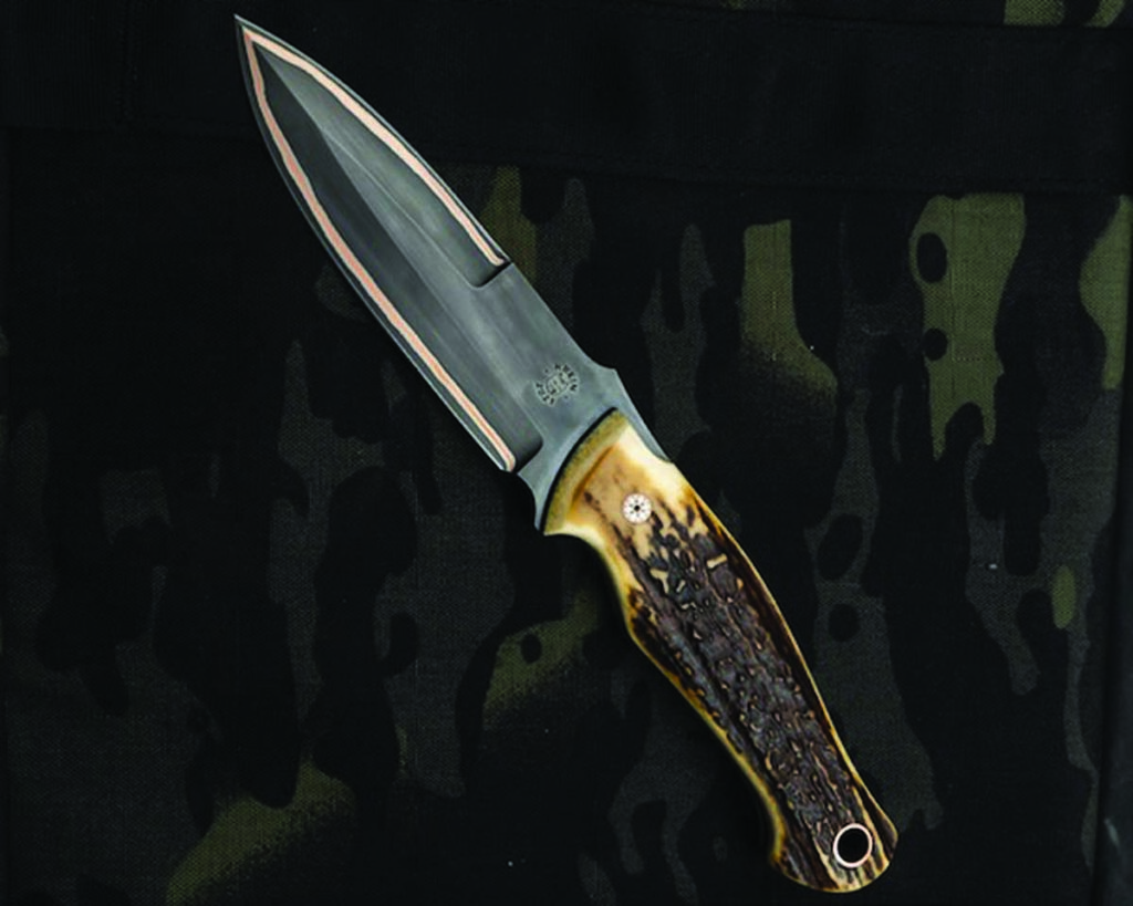 Tom Krein’s “Mako” model features a Dion Damascus san mai steel blade with a copper-color stag handle.