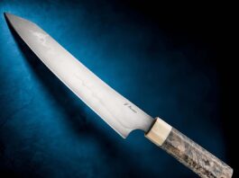 As far as simple carbon steels go, 1095 is often a favorite for edge holding, just the thing for a fine-cutting kitchen knife like this one by Jeremy Bartlett.