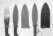 Three vintage OSS smatchets, from left: one with a “bright blade,” a very scarce variation of the top one featuring a Parkerized blade, and one with a wooden handle.