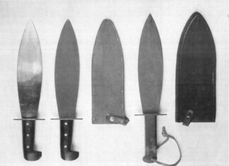 Three vintage OSS smatchets, from left: one with a “bright blade,” a very scarce variation of the top one featuring a Parkerized blade, and one with a wooden handle.