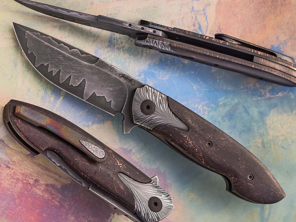 Marverik Murdock’s Steadfast has a 3.5-inch blade in a san-mai construction of CPM 154 stainless steel and CPM 3V carbon steel. The scales are Fatcarbon® space coral and the bolsters are feather damascus. Closed length: 4.25 inches. His price for a similar knife: $3,200.