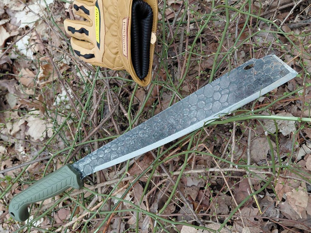 Chopping Japanese barberry, an invasive vine with painful thorns, is a necessary and annoying chore—the Condor Roarlock hacked it!