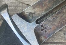 The logos of both makers appear on the blade above the ricasso of an EGA Dagger—Elishewitz at right and George at left.