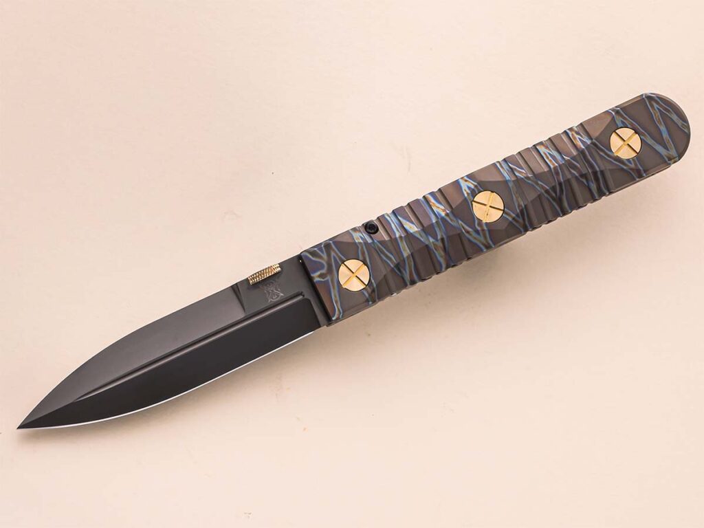 Allen and Les designed the Ek Integral Folder for Ketuo, winner of Best Imported Knife in the factory knife judging competition at the 2024 BLADE Show Texas. The knife is based on the Model 2 Ek Commando fixed blade. (SharpByCoop image)