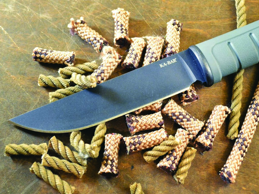 The KA-BAR Dust II tackled synthetic rappelling rope and stiff waxed cotton lariat rope. The full-ground D2 tool steel blade was no worse for wear and ready for more.