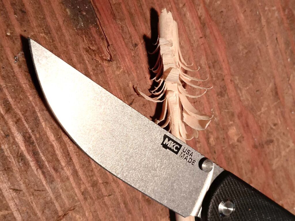 An adept whittler, the knife could shave fine and chunky curlicues from a piece of pine dowl. The 90-degree spine did have some bite on the offhand thumb when executing push cuts into the wood.