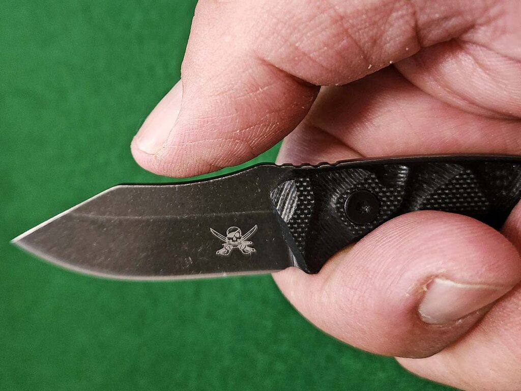 The author found the scallop on the back of the MK2 the perfect spot to land his thumb to get more power behind a cut. One might even think it was designed that way.